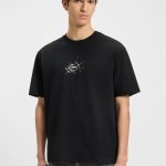 Camiseta relaxed fit de algodón con logo de diseño